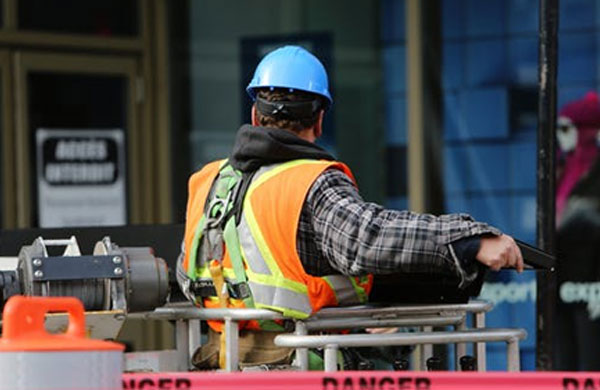 Gulisek Construction Employee Safely Working On Site