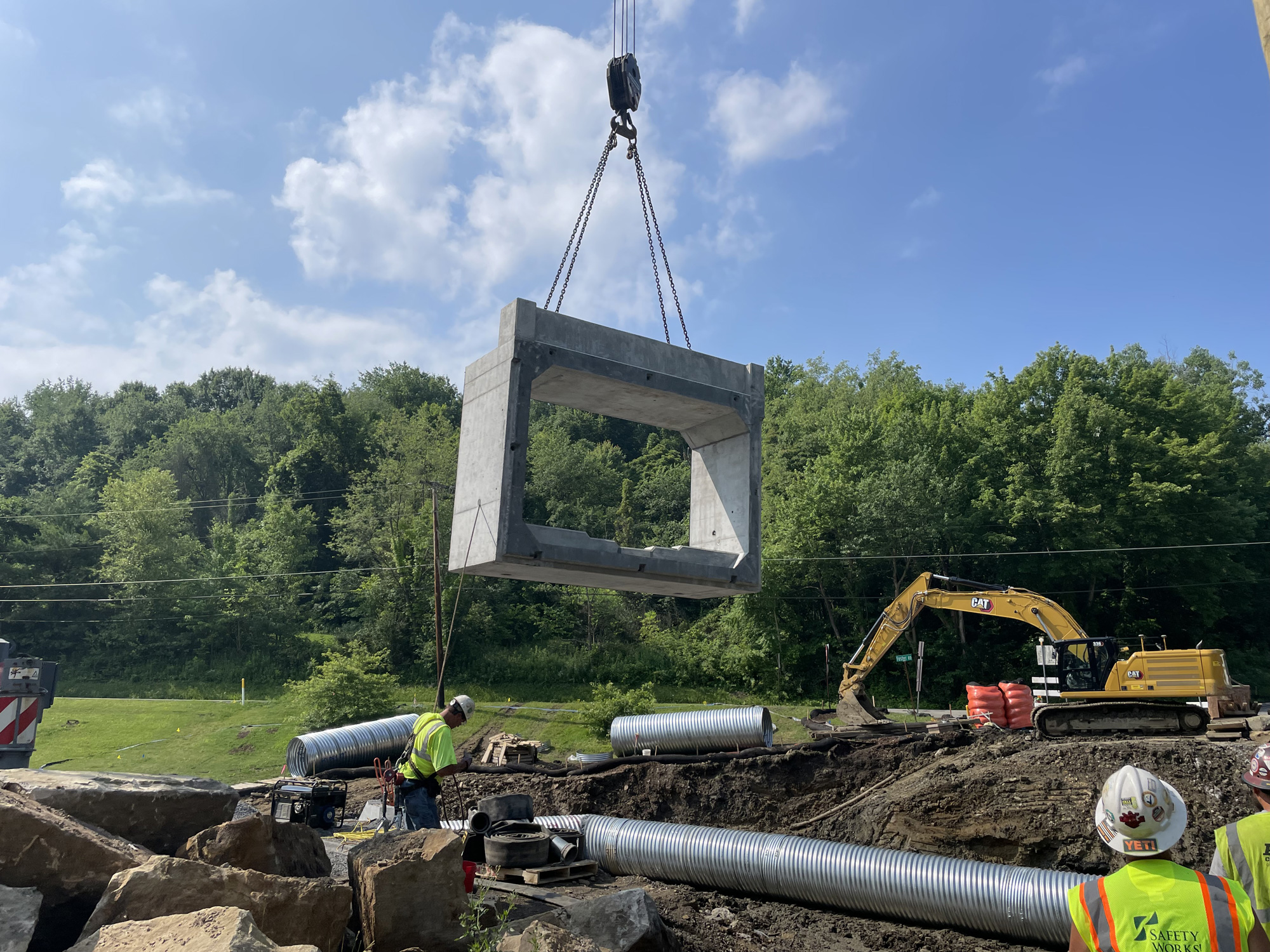 IMG_3956 Flying a box culvert section in place with crane